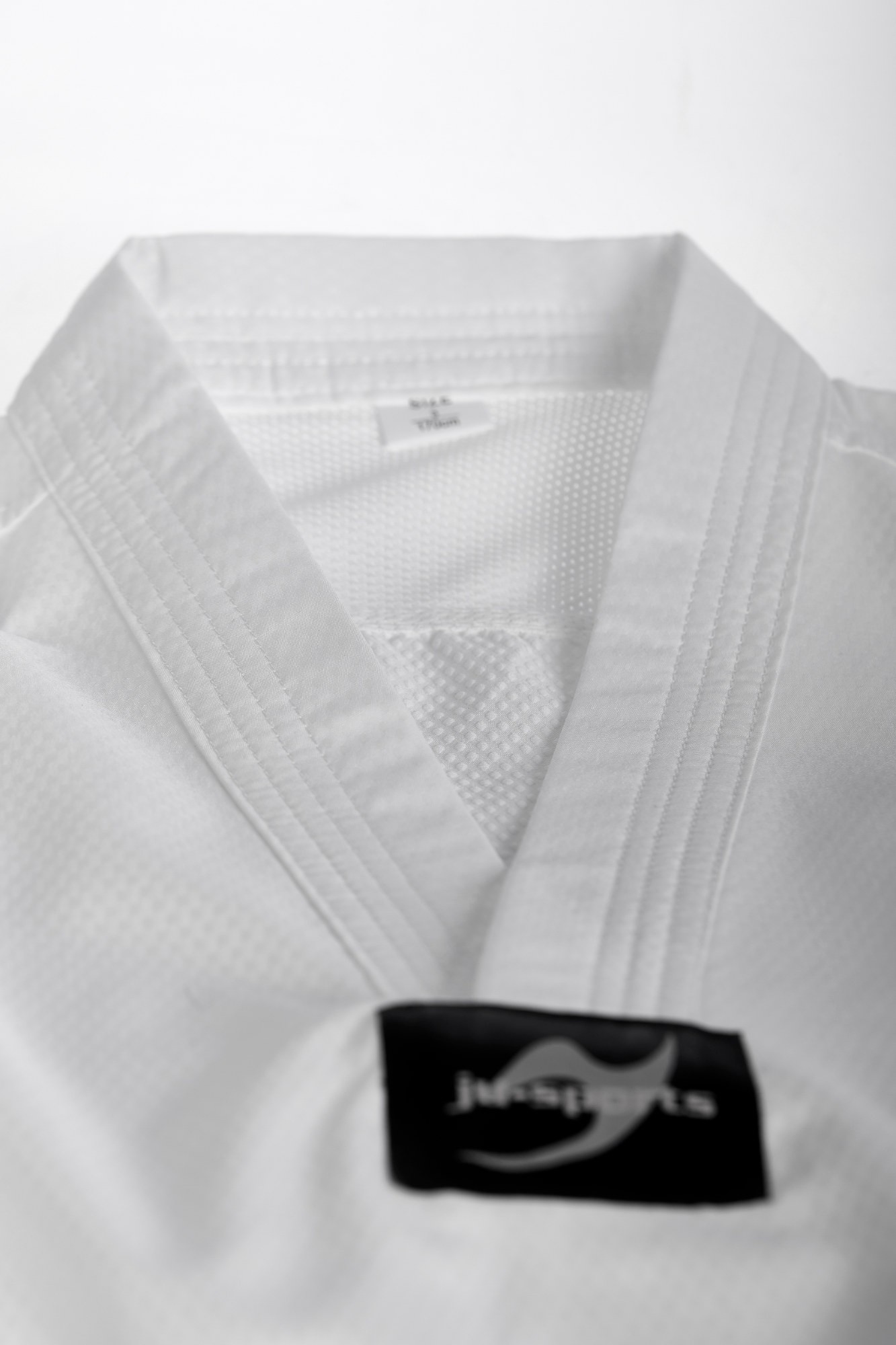 Taekwondo-pak student pro witte Revers